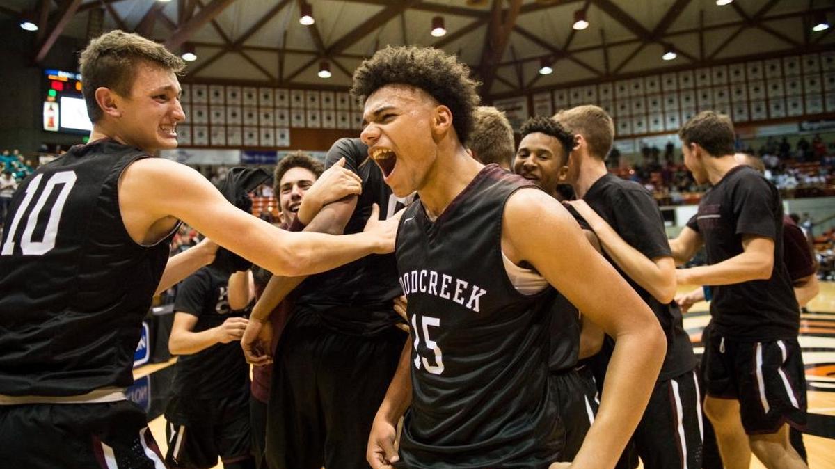 Jackson Hughes, center, and the Woodcreek High boys basketball team celebrate their victory over Sheldon in the Sac-Joaquin Section Division I championship March 4 in Stockton. The teams will meet again in the CIF NorCal Regional Open Division final Saturday in Santa Clara.