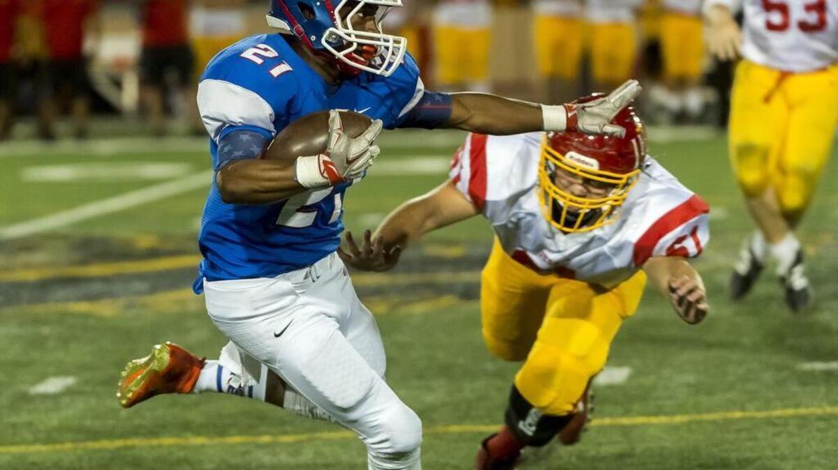 Christian Brothers High School Falcons Jamarri Jackson (21), runs with ball after his interception during the second quarter of the Holy Bowl between Christian Brothers High School Falcons and Jesuit High School Marauders at Hughes Stadium , Saturday, Sept. 10, 2016.