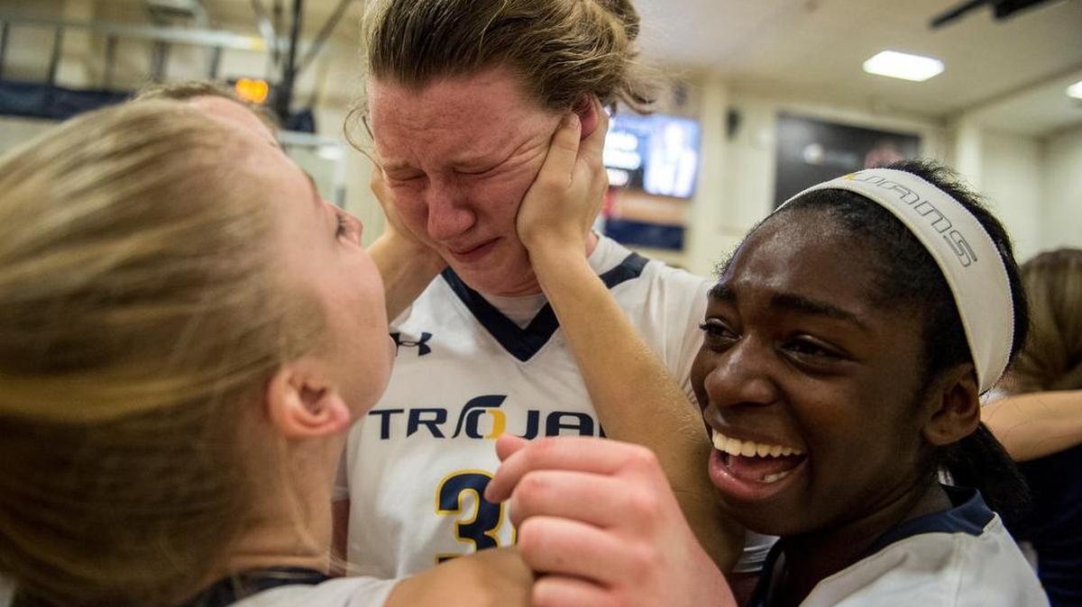 Oak Ridge center Kassidy DeLapp (30) is in tears following the top-seeded Trojans’ 40-33 victory over No. 2 seed McClatchy in Thursday night’s Sac-Joaquin Section Division I playoff game in El Dorado Hills.