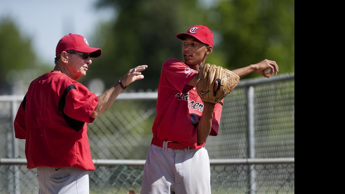 
Cordova baseball coach Guy Anderson, 79 gives some pitching advice to Jamari Campbell during practice at Cordova High School in 2011.
