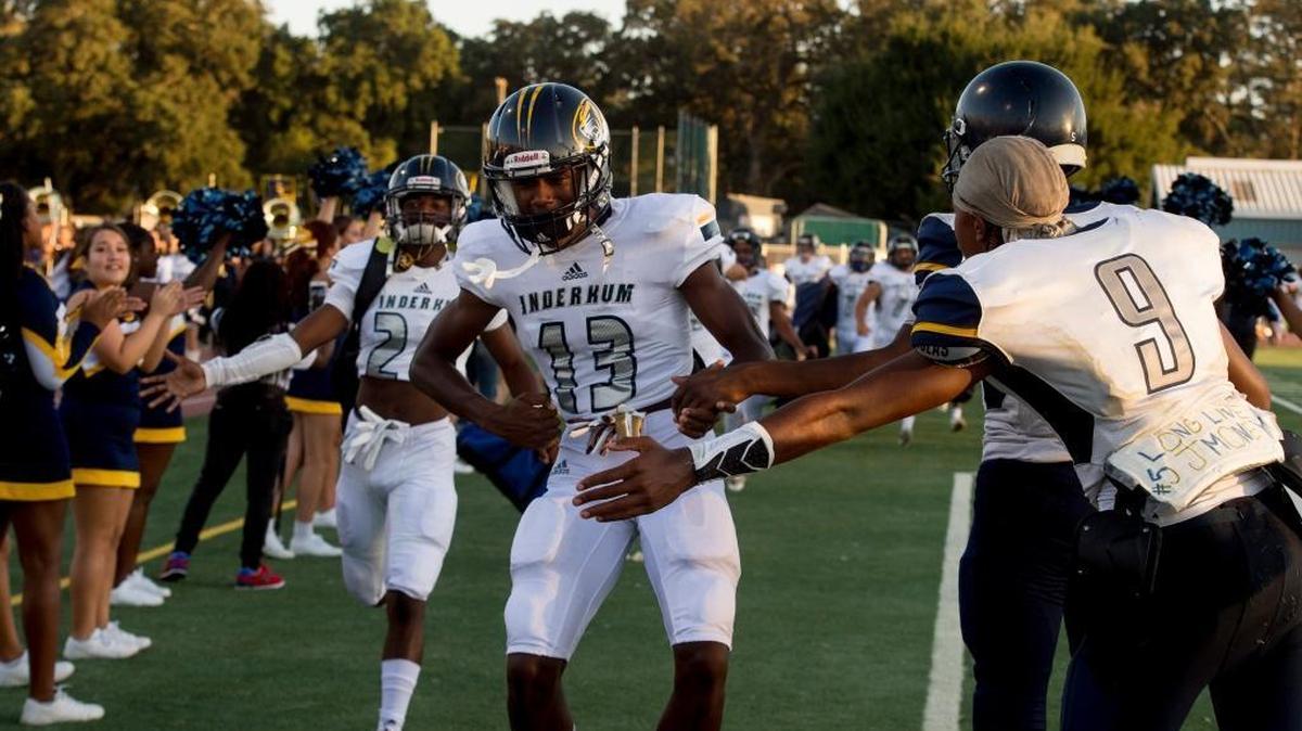 Isaah Crocker (13) and his Inderkum High teammates prepare for a game against host Elk Grove on Aug. 25. The Tigers host Kennedy on Friday.