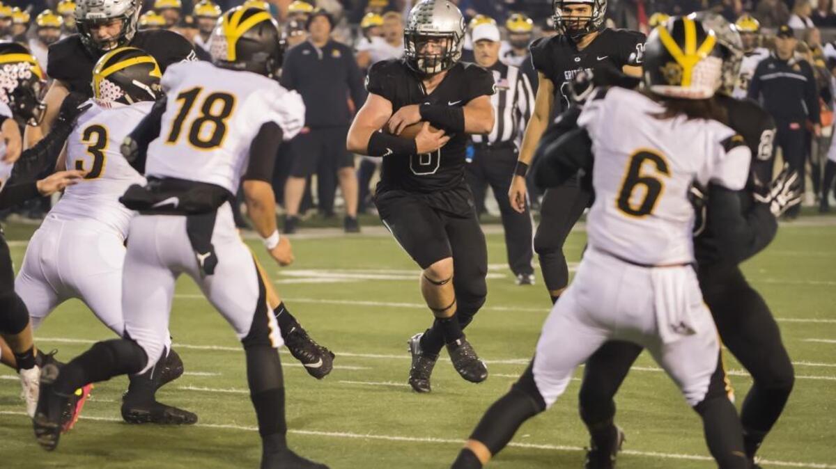 Granite Bay Grizzlies’ Evan Tattersall (6) runs with the ball during the second quarter as the Granite Bay Grizzlies host the Del Oro Golden Eagles in the Sac-Joaquin Section Division II championship game at Hornet Stadium at Sacramento State, Saturday, Dec. 2, 2017.