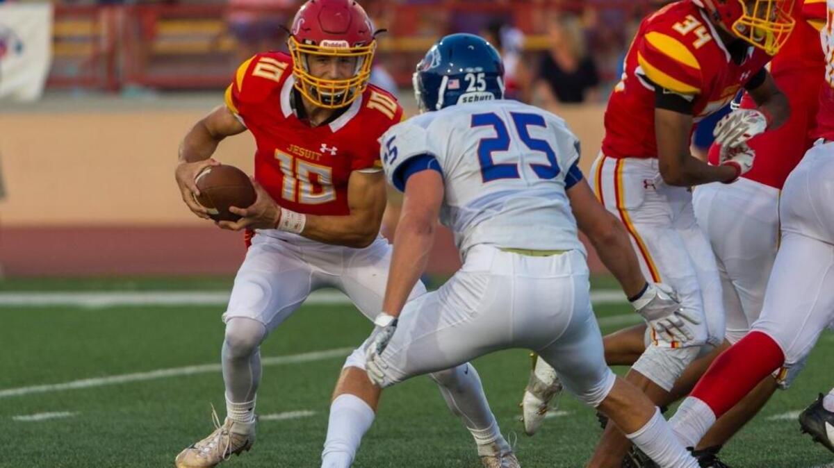 Jesuit’s Josh Farr (10) runs against Christian Brothers at Hughes Stadium on Sept. 9. Farr’s willingness to switch from quarterback to receiver is the sort of selfless play that has sparked a 10-game winning streak for Jesuit.