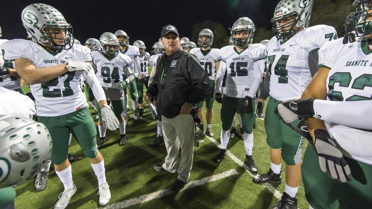 Granite Bay Grizzlies head coach Jeff Evans talks to his team before the game as the Del Oro Golden Eagles host the Granite Bay Grizzlies, Friday November 6, 2015.