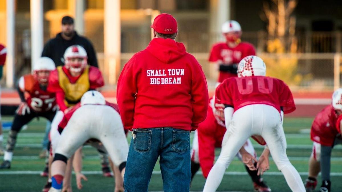 East Nicolaus coach Travis Parker, center, graduated from the school and applied for one teaching position and teaching job: this one.