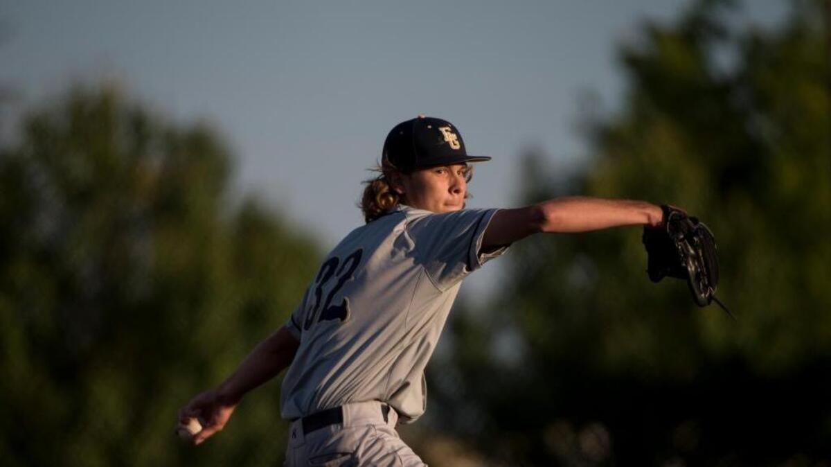 Elk Grove High School pitcher Alex Zalasky, throwing against Oak Ridge on Tuesday, May 24, 2016, in Sacramento, Calif., helped the Thundering Herd beat Tracy 14-0 in Game 1 of a best-of-three Sac-Joaquin Section Division I championship series in Stockton, Calif., on Friday, June 3, 2016.