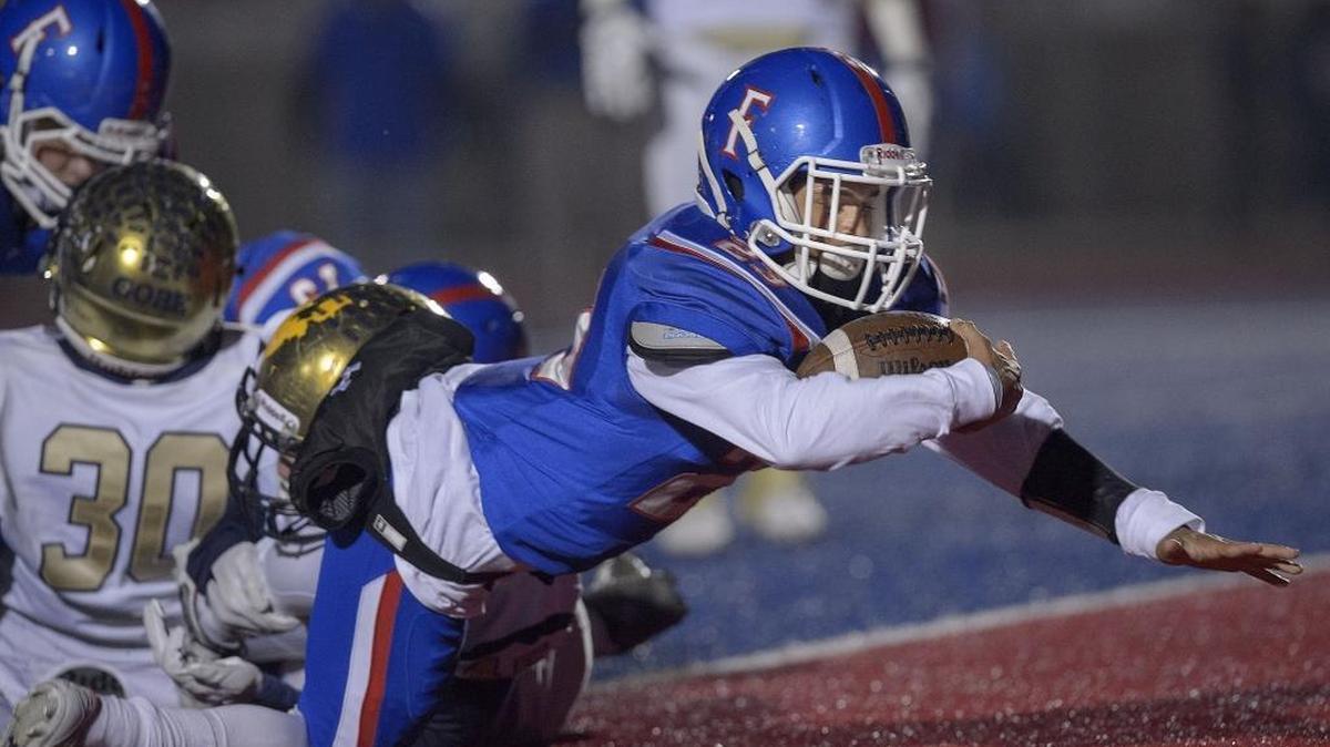 Folsom’s Brandon Rupchock scores to give the Bulldogs the early lead in Folsom on Friday, November 25, 2016.