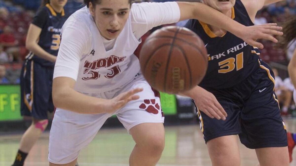 McClatchy’s Jordan Cruz (33), left, and Oak Ridge’s Hailey McCoy chase after a loose ball during the Division 1 NorCal Championship game on March 21, 2015, at Sleep Train Arena in Sacramento. Might there be a rematch.