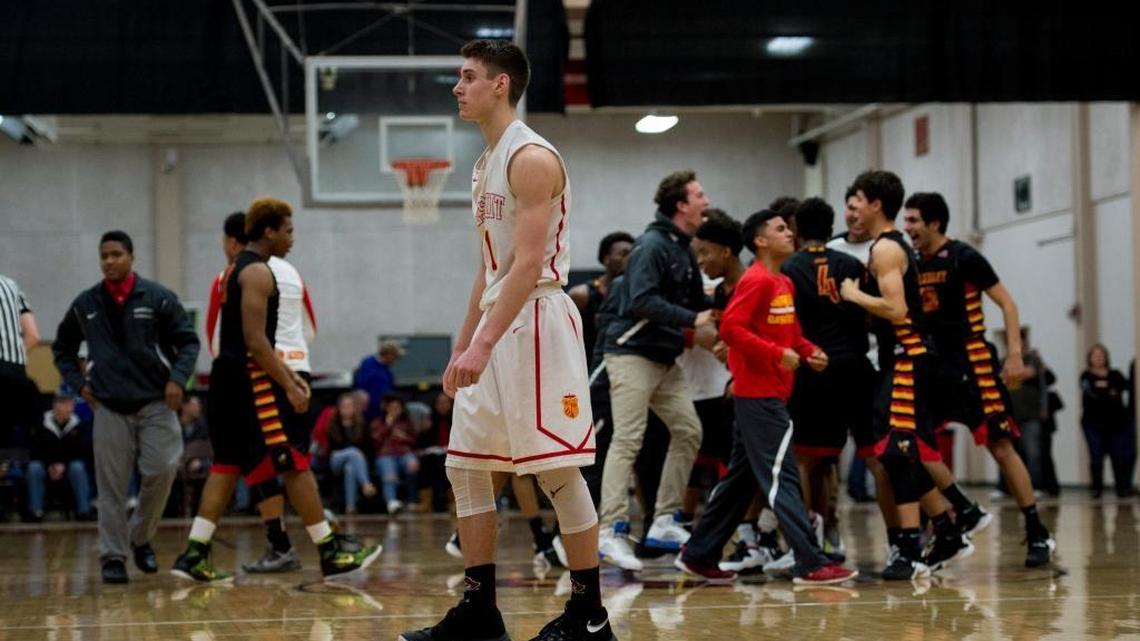 Jesuit High School Marauders guard Matthew Ehrlich (1) walks off the court after Jesuit’s loss in the NorCal Division I Playoff game between the Jesuit High School Marauders and Berkeley Yellowjackets on Saturday, March 12, 2016, at Jesuit High School in Carmichael, Calif.