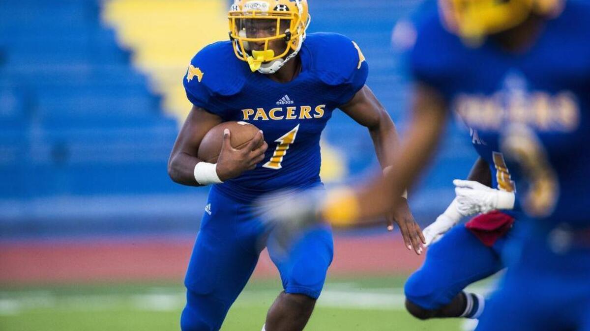 
Grant Pacers Michael Green (1), runs with the ball. 

