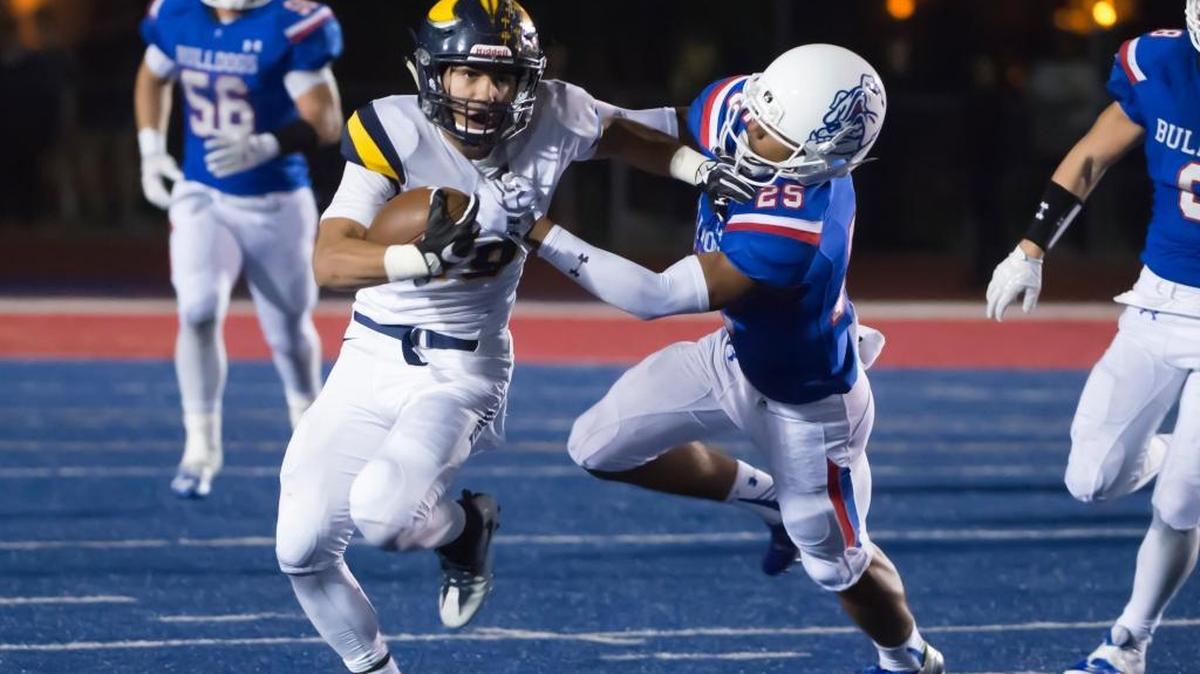 Oak Ridge’s Justin Poerio, shown running against Folsom last season, is one of the most versatile players in the state.