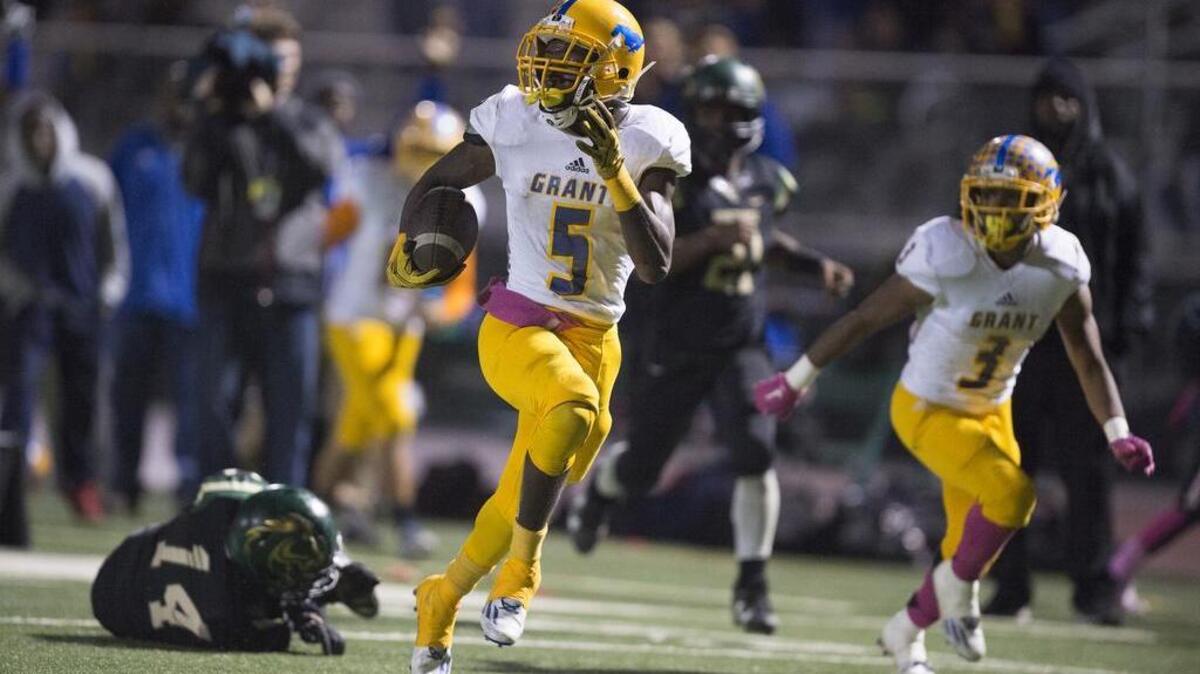 Grant's Lawerence Hardy runs 55 yards for a touchdown in the second quarter as the Pacers and Mustangs tied at 15.