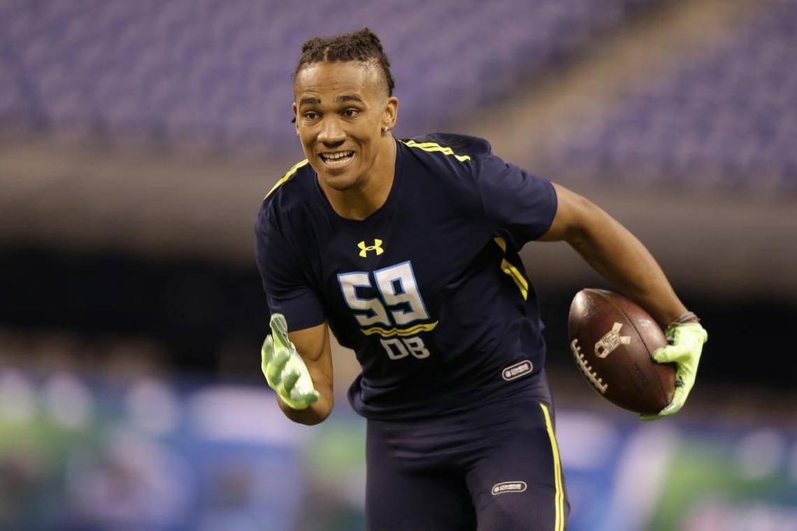 Colorado defensive back Ahkello Witherspoon runs a drill at the NFL football scouting combine in Indianapolis, Monday, March 6, 2017.