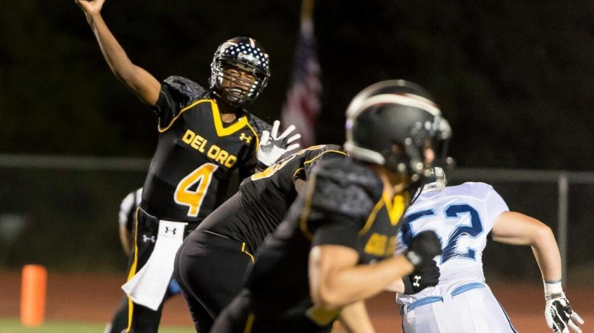 
Del Oro’s Stone Smartt (4) passes the ball against the Bellarmine Bells on Sept. 11. 
