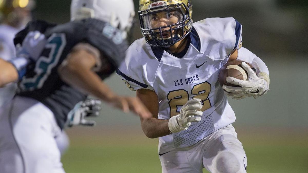 Thundering Herd’s Jaden Burns (22) carries the ball during the Delta League Championship game between the Elk Grove Thundering Herd and the Sheldon Huskies at Sheldon High School in Elk Grove on Friday, November 4, 2016. The Elk Grove Thundering Herd won the game 35-0.