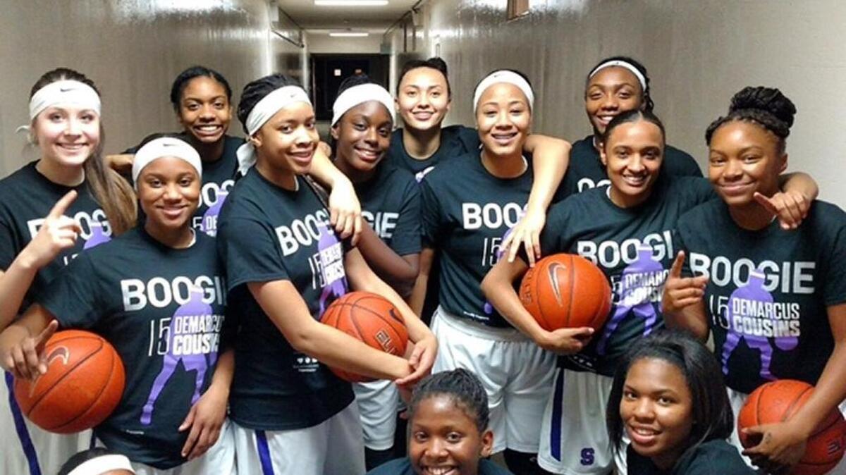 Members of the Sacramento High School girls basketball team plays by the motto ‘14 Strong’.