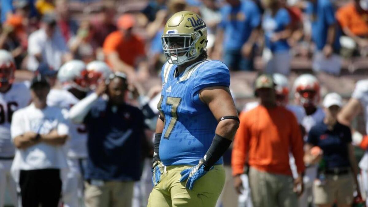 
UCLA defensive lineman Eddie Vanderdoes suffered a season-ending knee injury in the Bruins’ win over Virginia on Saturday, Sept. 5, 2015.
