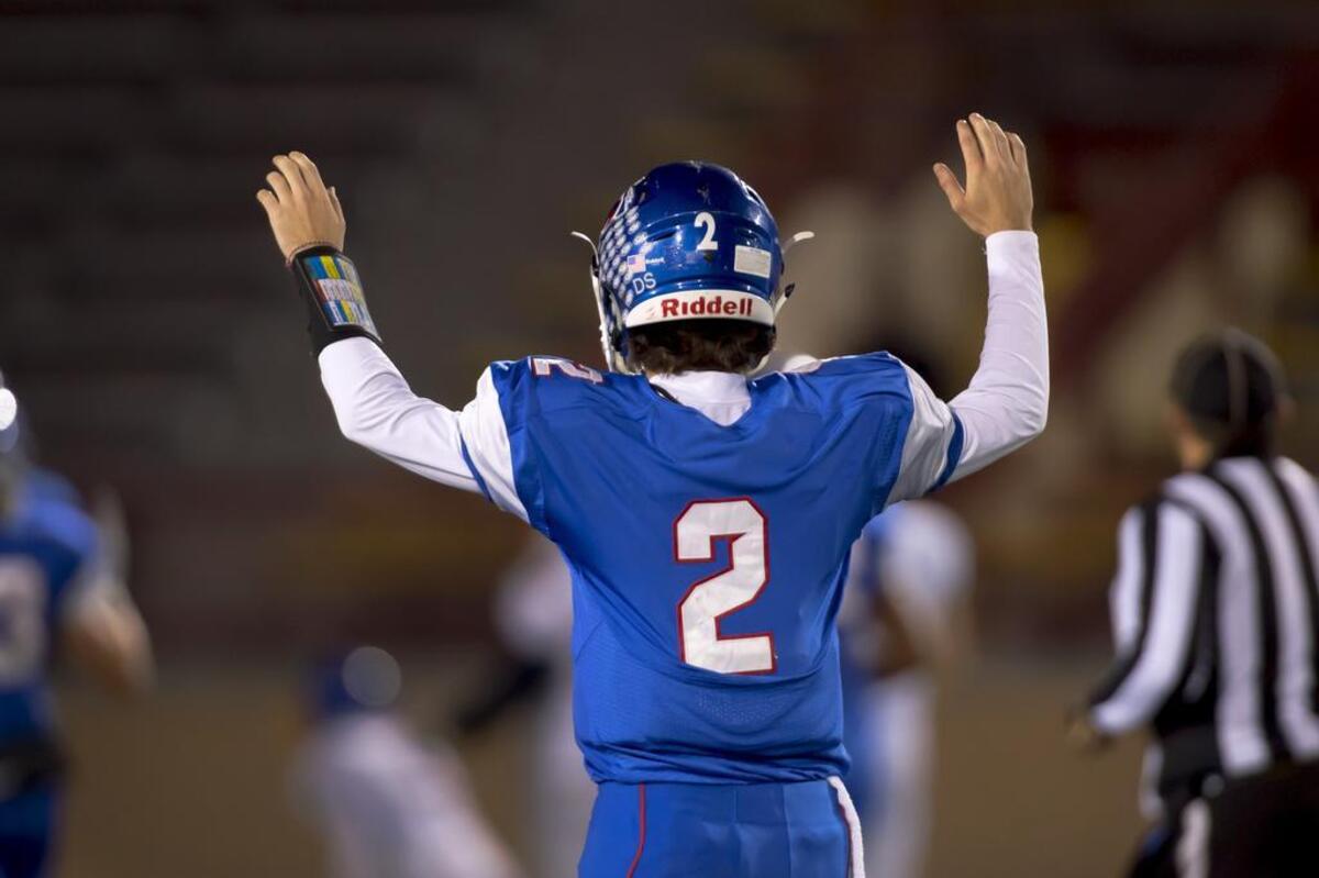 Christian Brothers Falcons Gunnor Faulk, (2), celebrates a touchdown pass as they host the Bencia Panthers in the Sac-Joaquin Section Division III playoff opener at Hughes Stadium, Friday Nov 10, 2017.