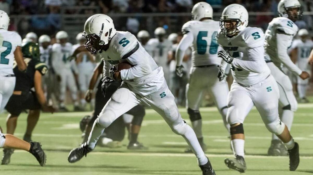 Sheldon High’s Alex Cook (2), runs for a touchdown in a high school football game against Monterey Trail on Friday, Sept. 23, 2016 in Elk Grove. Sheldon won 27-22 and is ranked 12th this week in the The Bee’s Top 20. The Huskies (4-0) were No. 14 last week. Monterey Trail (3-1) dropped from No. 10 to 13th.