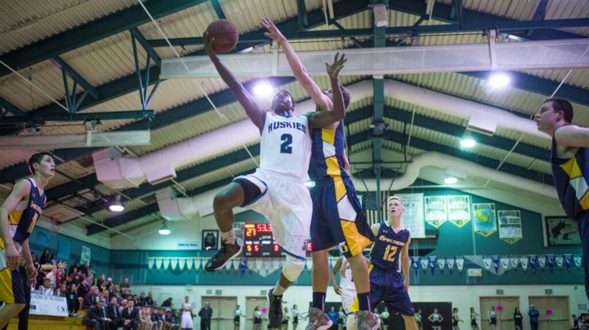 Sheldon High School guard Drew Cobb (2), shown here in a game last season against Oak Ridge, had 18 points, eight rebounds and five assists in Friday night’s win over visiting Granite Bay in a Sac-Joaquin Section Division I basketball playoff game.