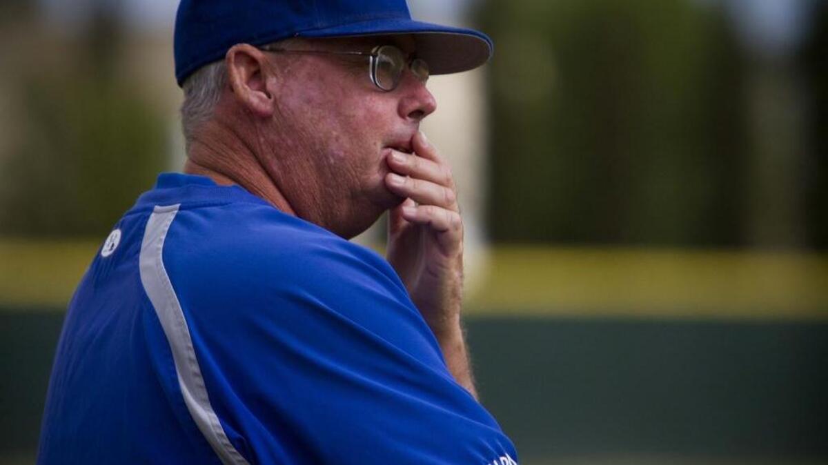 FILE - Davis coach Dan Ariola watches action in the first of two games to decide the D-1 championship between the Blue Devils and the Franklin Wildcats at Sacramento City College on Friday, May 25, 2012. Davis defeated Del Oro 5-1 in a playoff game on Saturday, May 22, 2017.