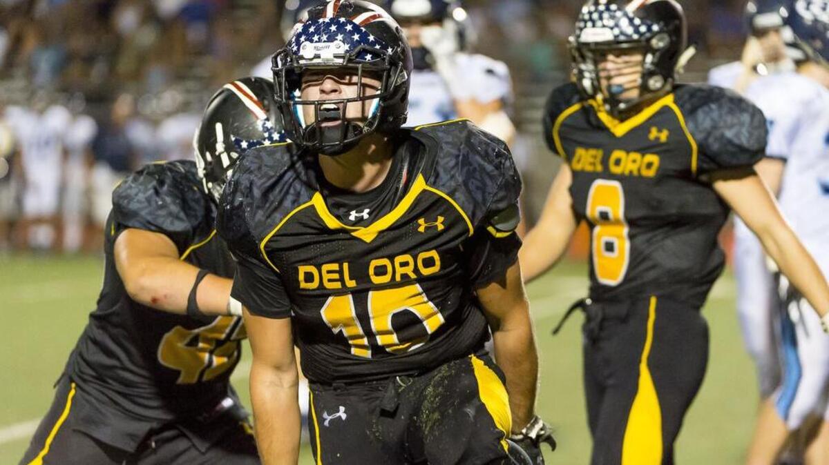 Del Oro’s Ray Thomas (10), celebrates a defensive stop during the fourth quarter as the Del Oro Golden Eagles host the Bellarmine Bells, Friday September 11, 2015.