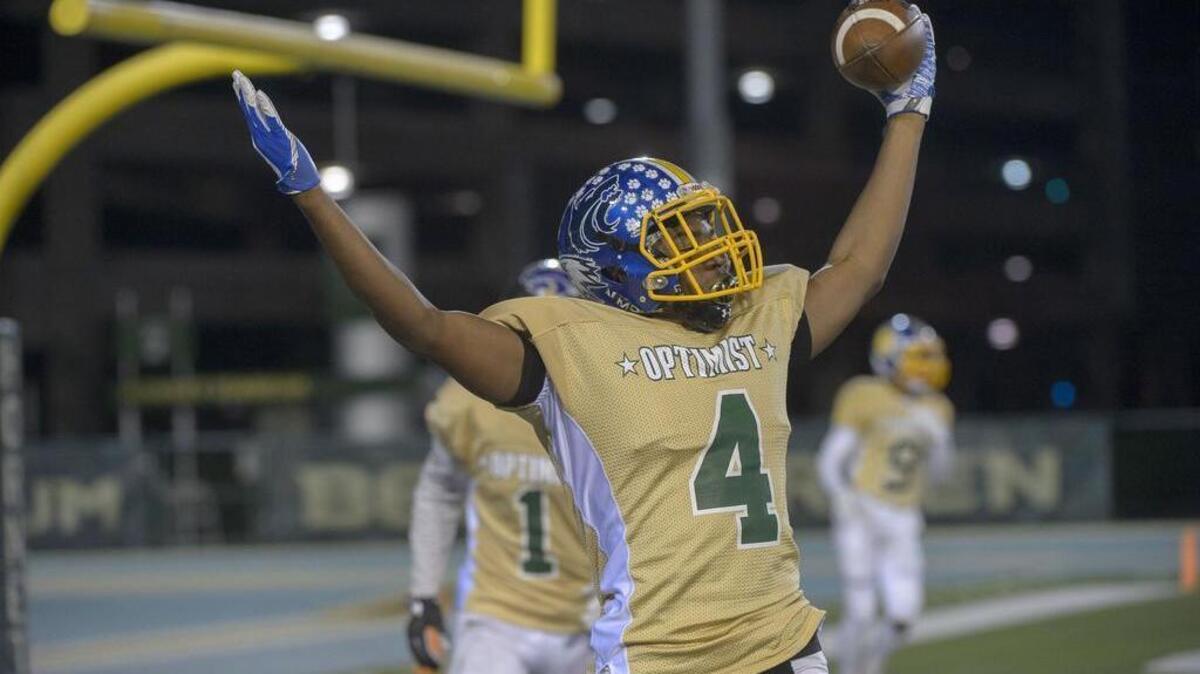 South receiver Marshaun Hunter (4) celebrates after catching a pass for a touchdown. The score put the South ahead 24-17 with just over seven minutes remaining in the game.