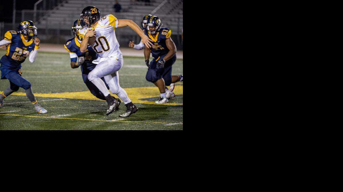 
Rio Linda quarterback Zak Burden (20), shown in an October game against Inderkum, threw four touchdown passes and caught a TD pass in last Friday’s win over Sierra of Manteca.



