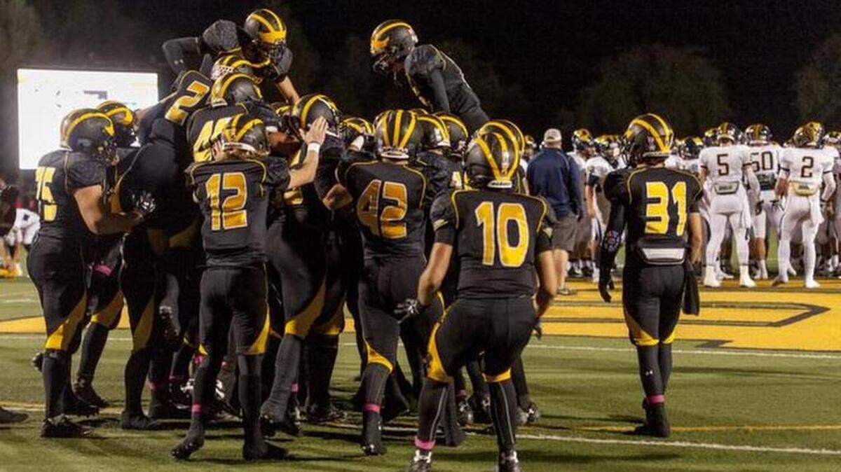 
The Del Oro Golden Eagles come on the field before the game as they host the Oak Ridge Trojans, Friday October 17, 2014.
