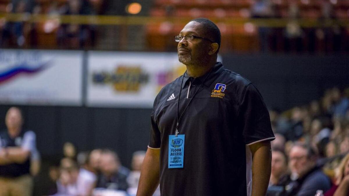 Grant Pacers head coach P. Deonard Wilson looks on during the first half.