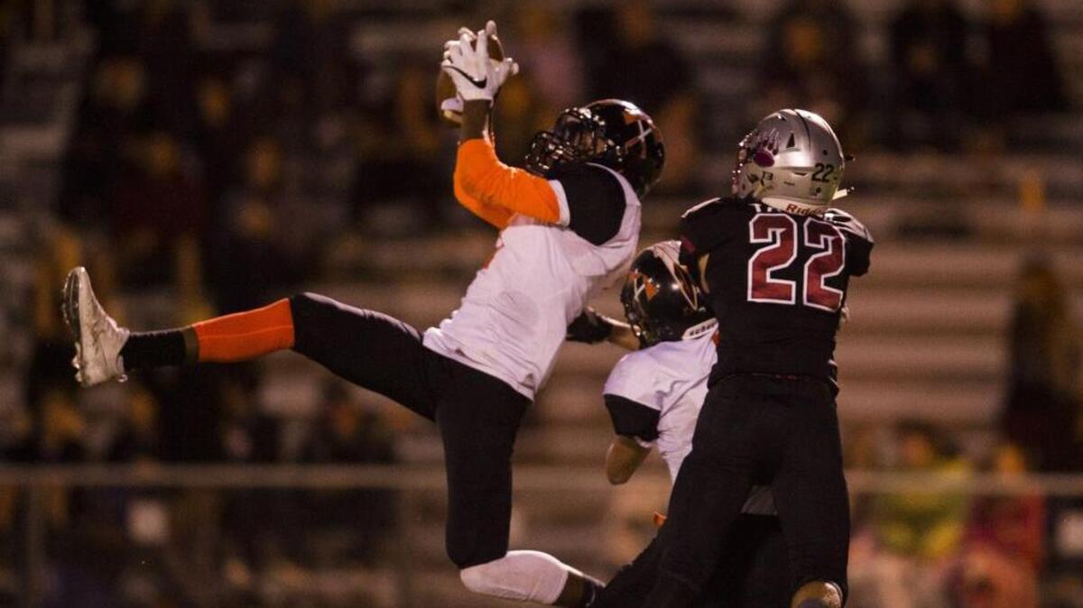Marysville Indians Cornell Greenwood (1) intercepts the ball late in the fourth quarter at a game between the Bear River Bruins and Marysville Indians on Friday, Sept. 16, 2016, at Bear River High School in Grass Valley, Calif.