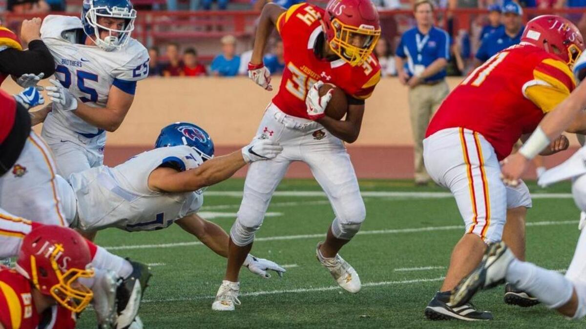 Jesuit’s Isaiah Rutherford runs against Christian Brothers earlier this season. On Friday against Grant, Rutherford’s 80-yard touchdown run highlighted the Maurauders’ 23-17 victory.