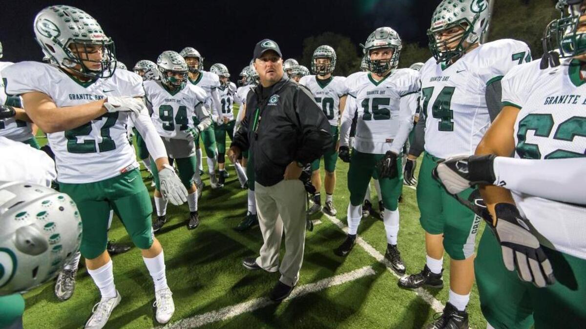 Granite Bay coach Jeff Evans talks to his team before facing Del Oro in 2015.