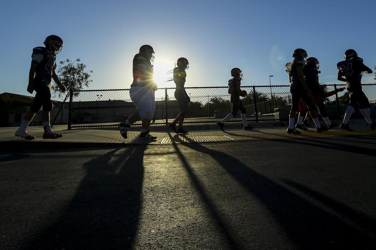 The San Juan Spartans come out of the locker room before hosting the Mira Loma Matadors in 2016.