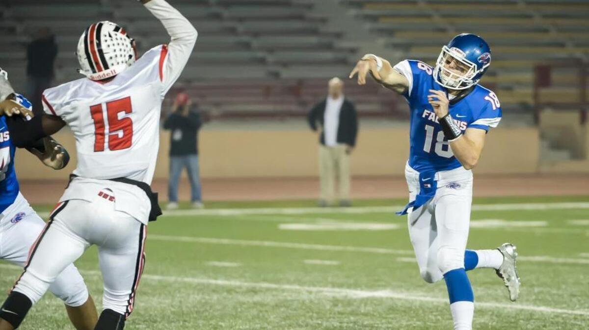 Christian Brothers Falcons Tyler Vander Waal (18), passes the ball during the first quarter of the Sac-Joaquin Section Division I football playoff game between the Christian Brothers Falcons and Cordova Lancers at Hughes Stadium, Friday, Nov. 11, 2016.