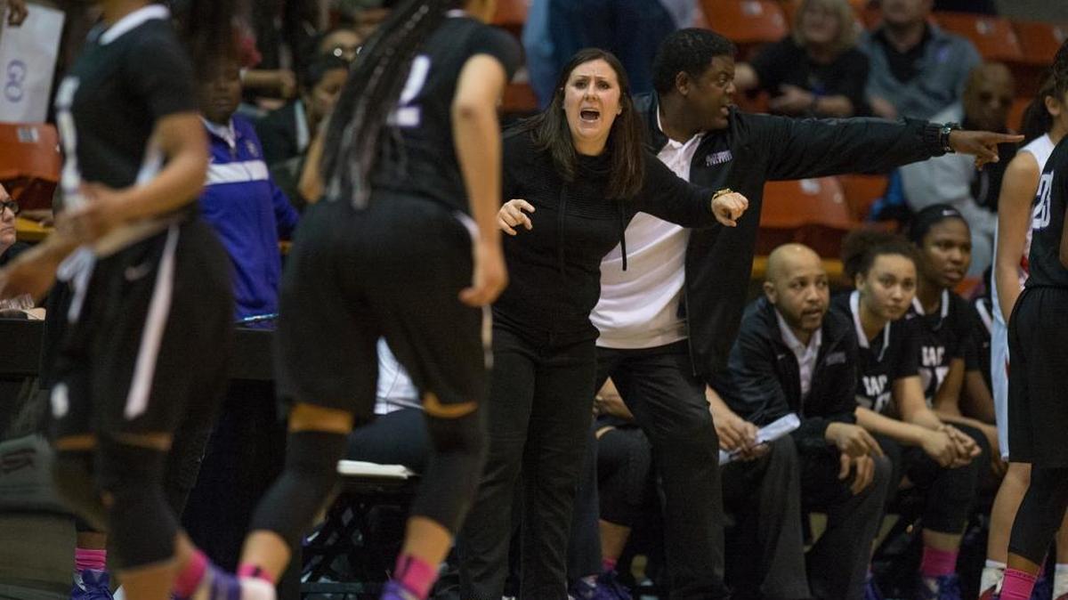 Sacramento High coach Michele Massari will guide her No. 2 Dragons against No.1 McClatchy on Wednesday, Jan. 25, 2017. ... Massari urges her team to get back on defense during a Sac-Joaquin Section girls basketball semifinal playoff game against Antelope, March 1, 2016 in Stockton.