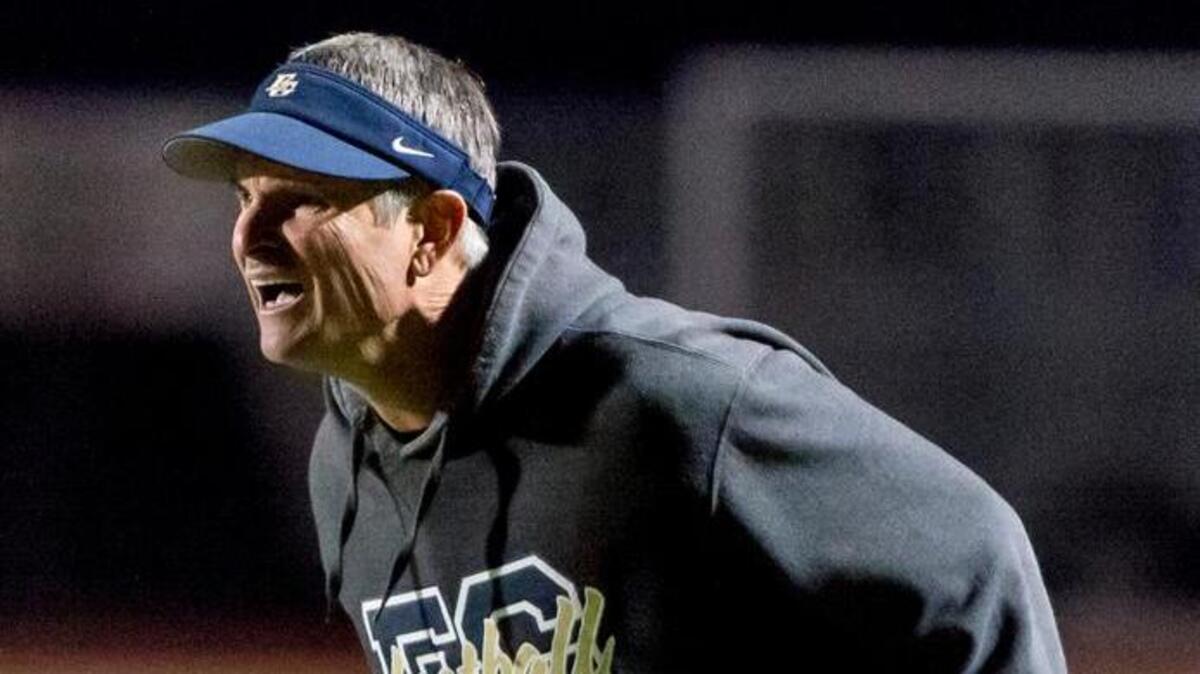 Elk Grove High football coach Chris Nixon looks for an answer from the referee during the Sac-Joaquin Section Division I semifinal on Nov. 27, 2015.