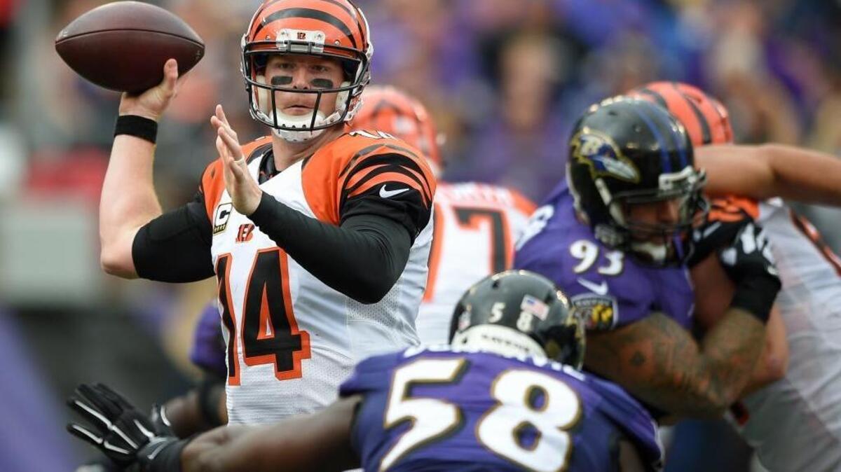 
Bengals quarterback Andy Dalton has completed 67.2 percent of his passes for 1,187 yards and nine touchdowns. He’s only thrown one interception and the Bengals are 4-0 for the first time since 2005. Here he passes during an NFL football game against the Baltimore Ravens in Baltimore, Sunday, Sept. 27, 2015. 
