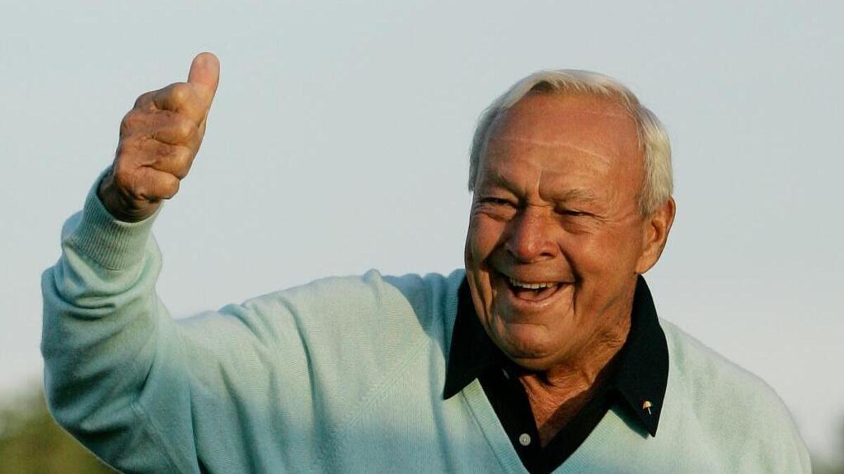 Arnold Palmer acknowledges the crowd after hitting the ceremonial first tee shot prior to the 2007 Masters at the Augusta National Golf Club in Augusta, Ga., on April 5, 2007. Palmer, who made golf popular for the masses with his hard-charging style, incomparable charisma and a personal touch that made him known throughout the golf world as “The King,” died Sunday, Sept. 25, 2016, in Pittsburgh. He was 87.