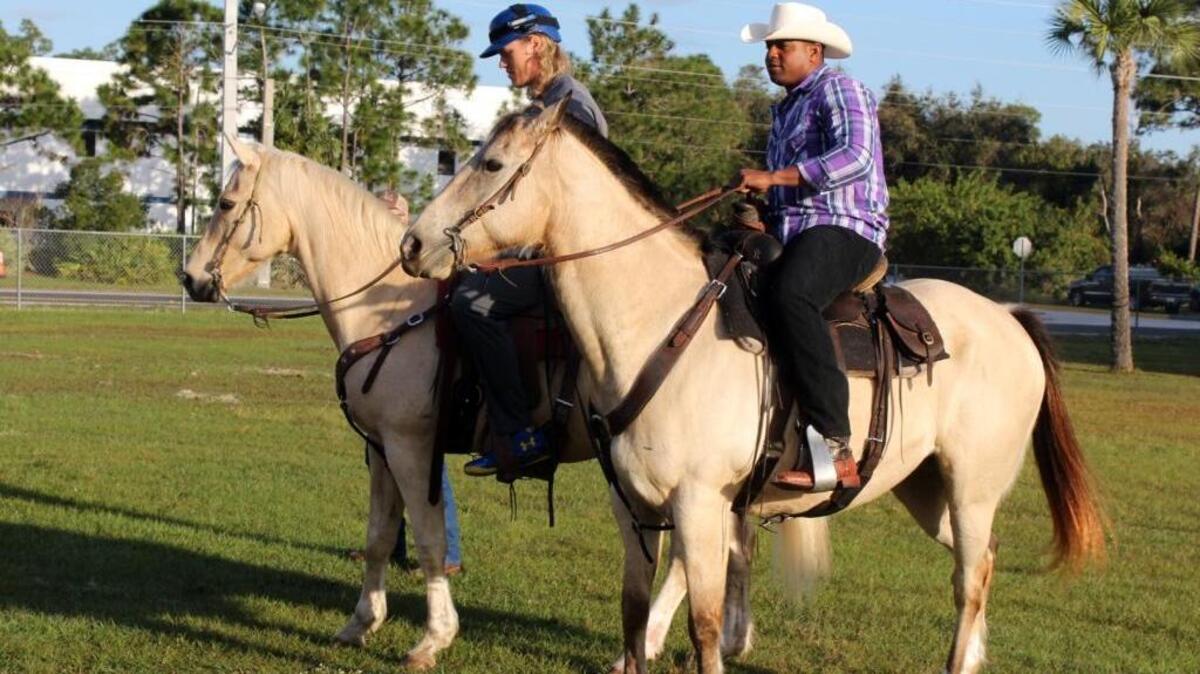 New York Mets’ Yoenis Cespedes, right, and Noah Syndergaard ride horses at the team’s spring training baseball facility, Tuesday, March 1, 2016, in Port St. Lucia, Fla.