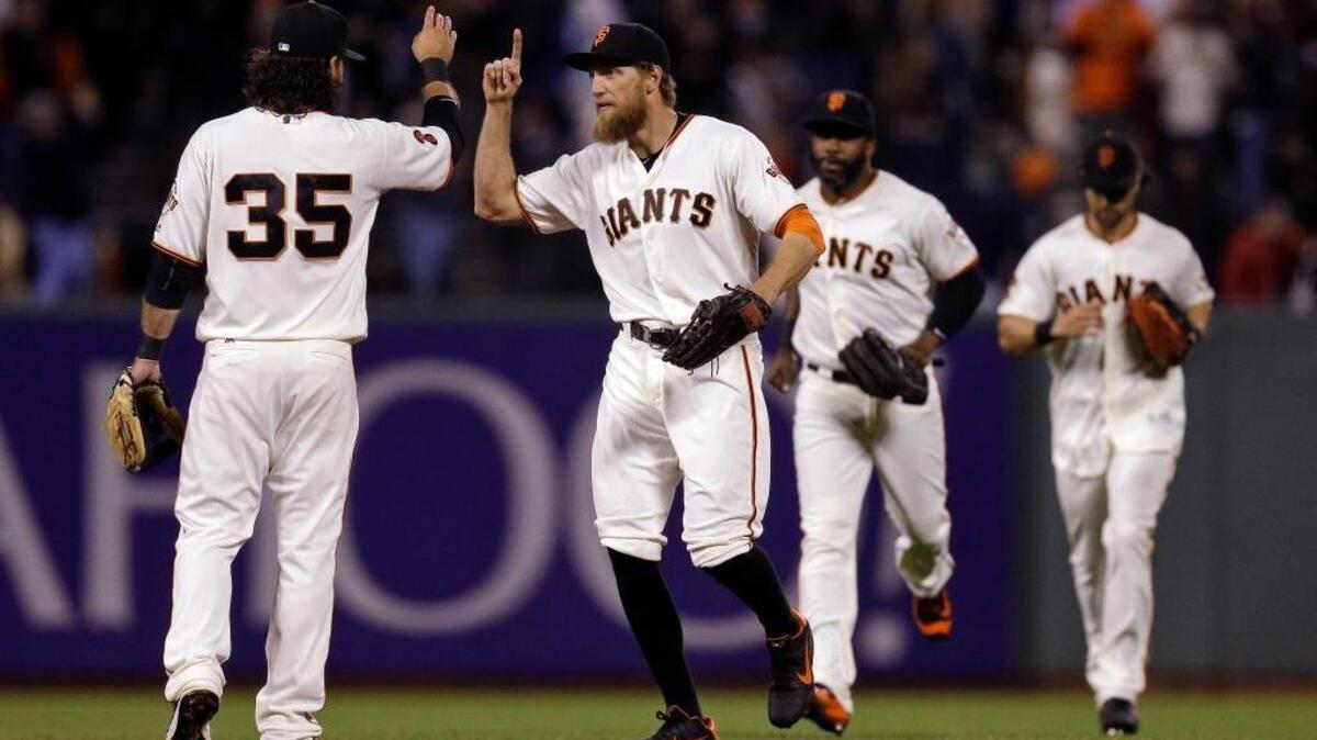 The Giants put a little distance between themselves and the Cardinals with a 6-2 win over St. Louis in San Francisco on Thursday night. The Giants lead the Mets by one game in the wild-card race, and St. Louis by two.