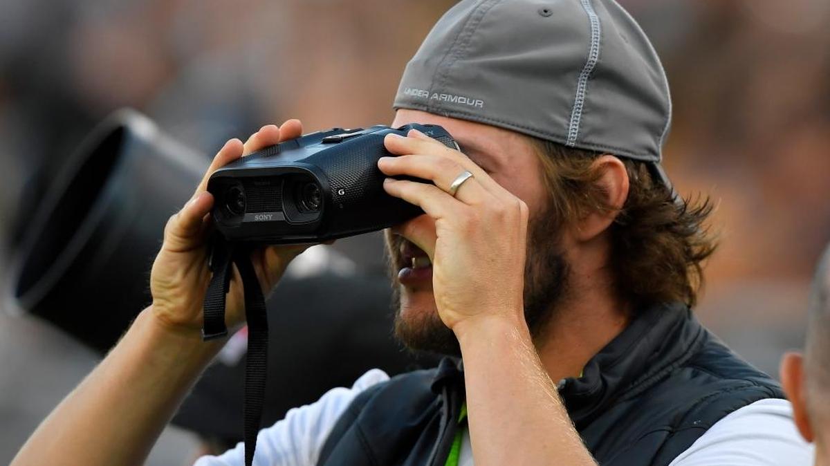 Dodgers pitcher Clayton Kershaw stands on the sideline during a preseason NFL football game between the Los Angeles Rams and the Dallas Cowboys, Saturday, Aug. 13, 2016, in Los Angeles. He could be standing on a mound soon for Los Angeles.