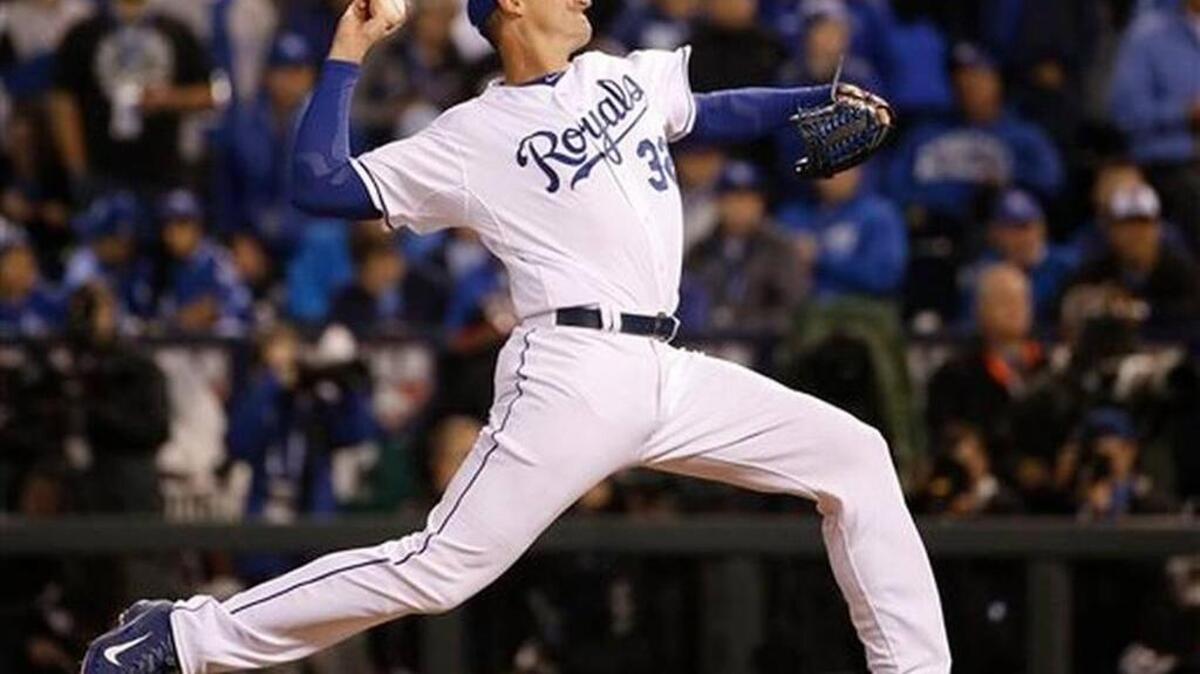 Kansas City Royals pitcher Chris Young throws during the 12th inning of Game 1.