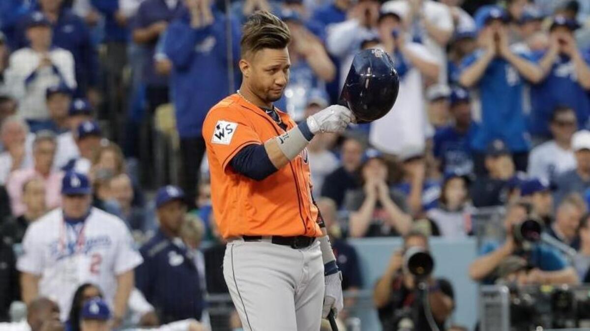 Houston Astros first baseman Yuli Gurriel tips his helmet to Los Angeles Dodgers pitcher Yu Darvish during Game 7 of the World Series on Wednesday in Los Angeles.