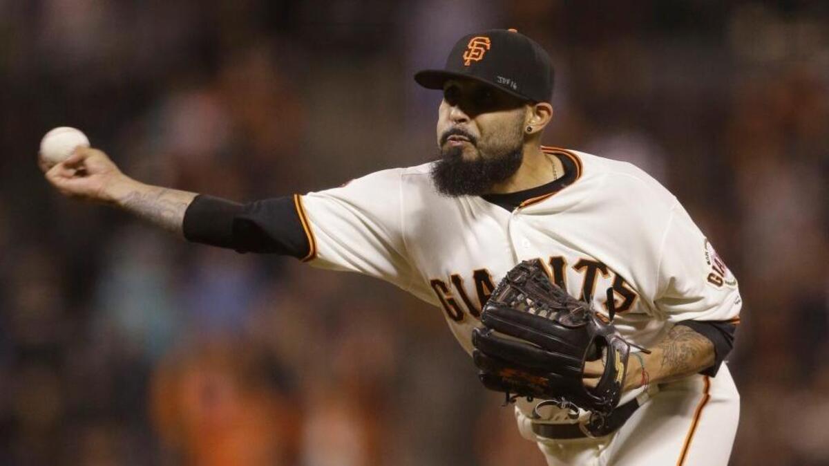 San Francisco Giants pitcher Sergio Romo throws against the Colorado Rockies in the ninth inning of a baseball game Thursday, Sept. 29, 2016, in San Francisco.