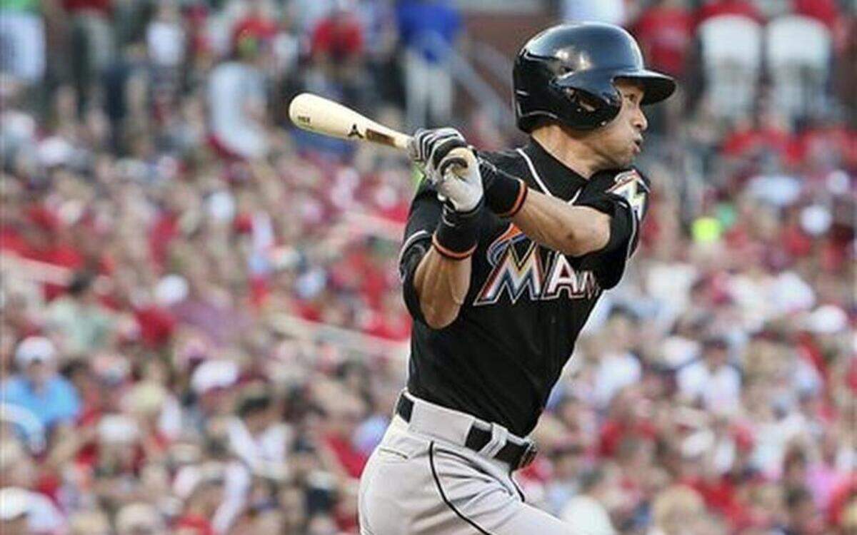 
Miami’s Ichiro Suzuki hits a single in the first inning against St. Louis, Saturday, Aug. 15, 2015 in St. Louis.
