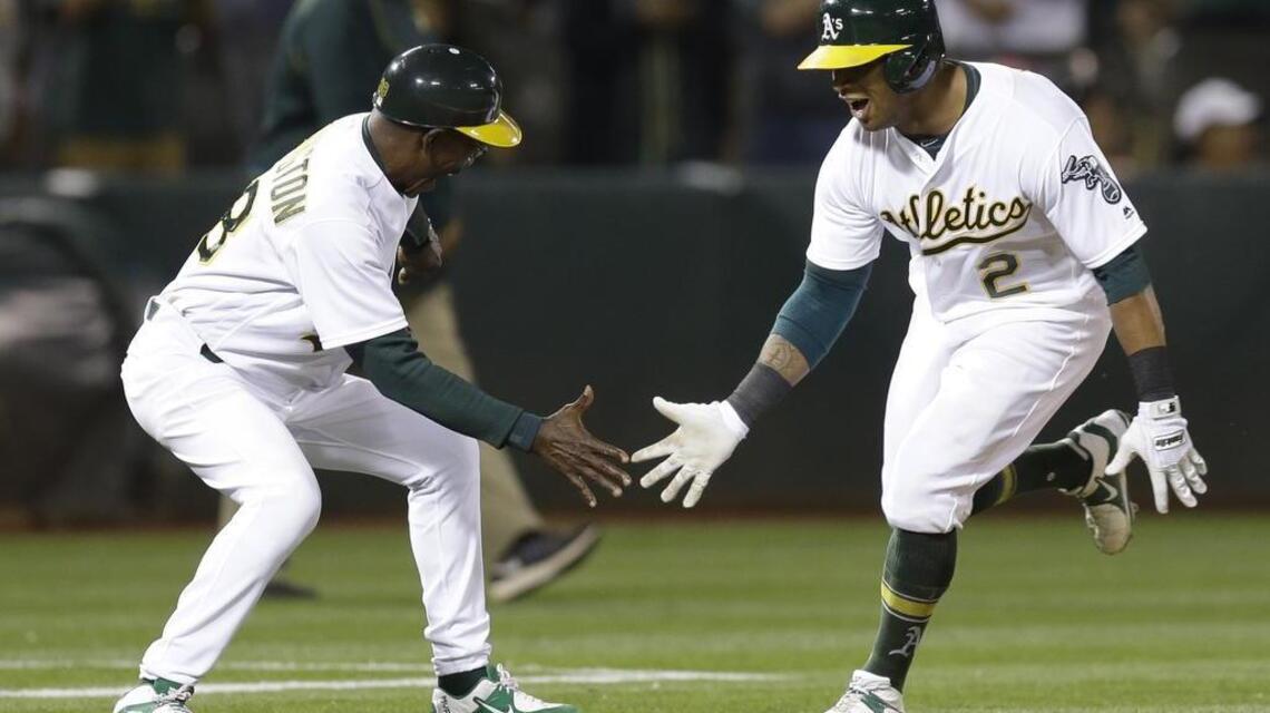 Khris Davis hits three home runs, walk-off grand slam in A’s 8-5 win