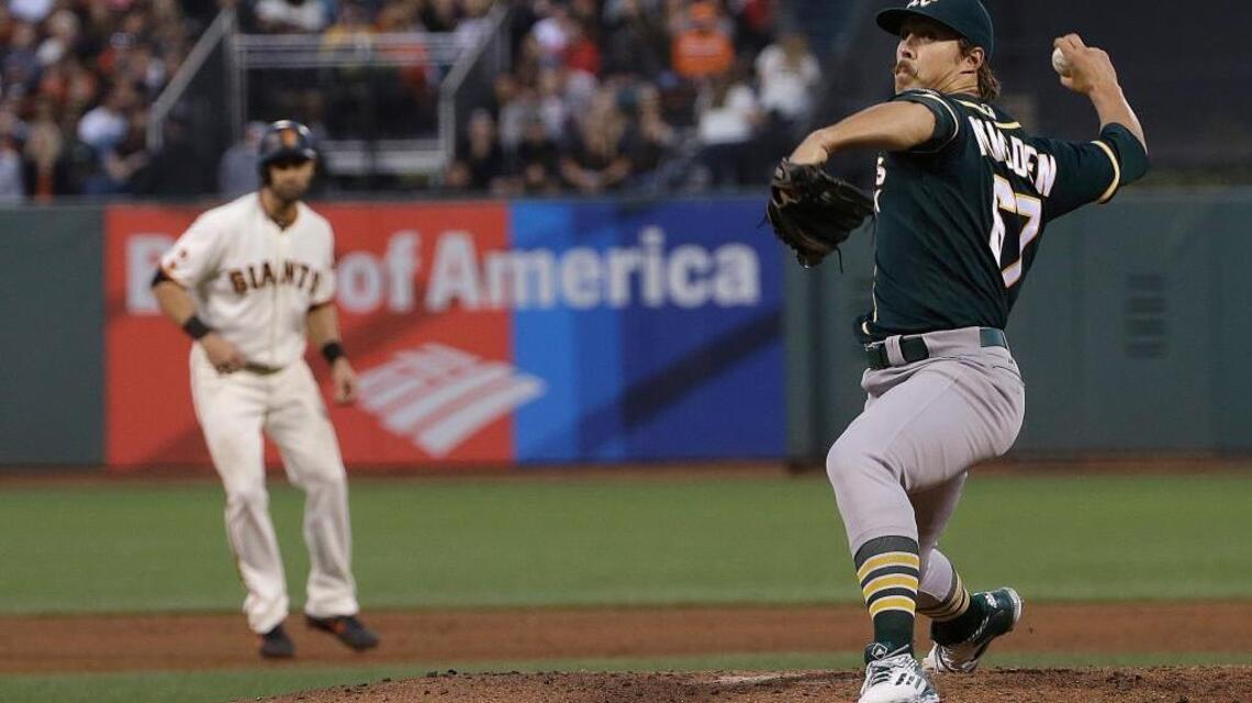 Mengden earns first big-league win, A’s beat Giants 8-3