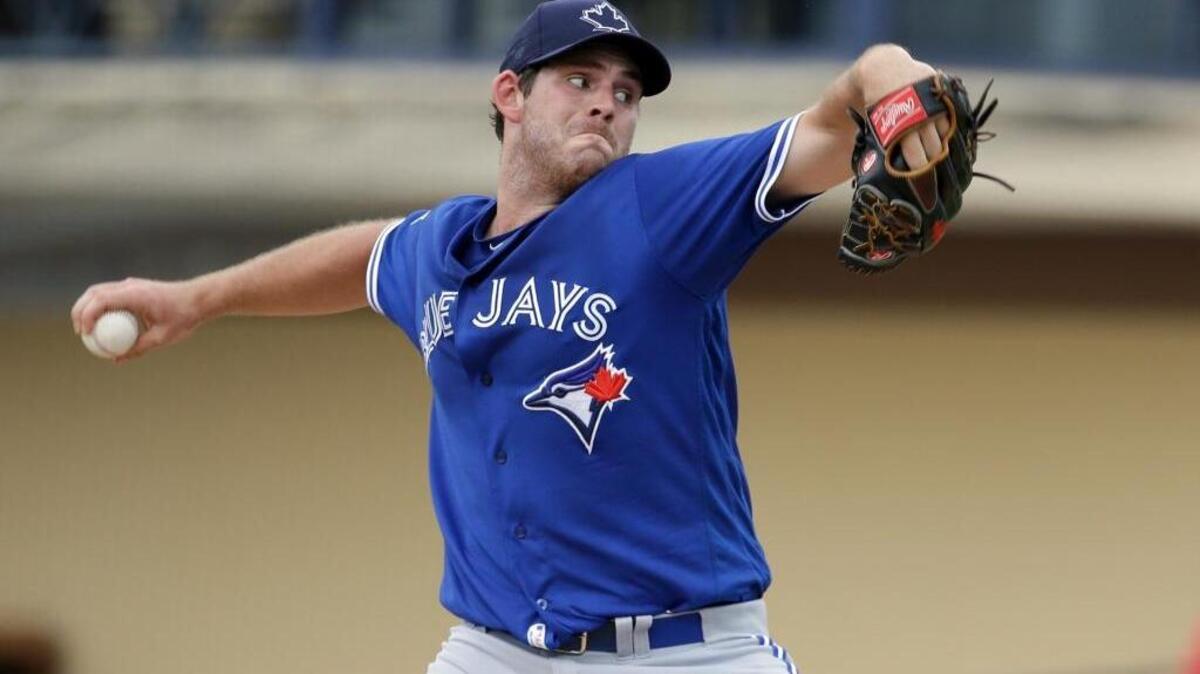 Toronto’s Joe Biagini said one of his favorite things about pitching in the majors is the pants. Here he throws against Detroit in spring training on Tuesday, March 29, 2016, in Lakeland, Fla.