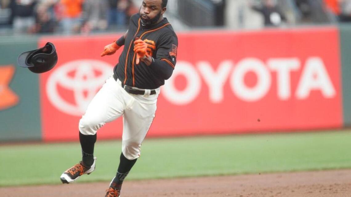 Kelly slam, Phillies beat Giants 12-9 to end 6-game skid